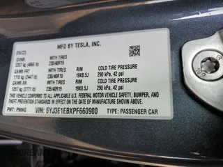 2023 Tesla Model 3 Long Range with VIN 5YJ3E1EBXPF660900, listed as a Copart auction lot 48923265 with 9,954 mi miles and Salvage Title. Bid and sale history available at DreamBid. Image 14.