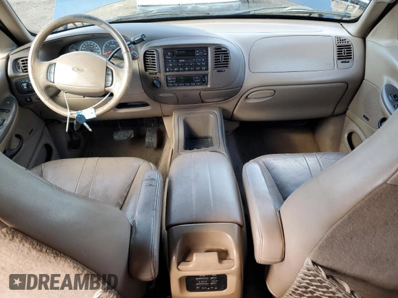 1999 Ford Expedition XLT z VIN 1FMPU18L5XLB51556, wystawiony jako Copart lot #49698855 z przebiegiem 194 898 mil mil oraz Szkoda całkowita • Salvage title. Historia ofert i sprzedaży dostępna na DreamBid. Obrazek 8.