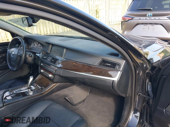 2014 BMW 5 Series 528i xDrive z VIN WBA5A7C58ED617405, wystawiony jako IAAI lot #42375456 z przebiegiem 135 184 mil mil oraz . Historia ofert i sprzedaży dostępna na DreamBid. Obrazek 5.