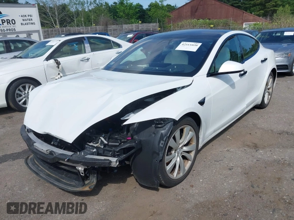 2021 Tesla Model S Long Range with VIN 5YJSA1E57MF428512, listed as a IAAI auction lot 42511020 with 29,611 mi miles and . Bid and sale history available at DreamBid. Image 20.