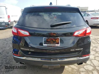 2019 Chevrolet Equinox Premier z VIN 3GNAXYEX9KL399167, wystawiony jako Copart lot #57021775 z przebiegiem Nie podano mil oraz Szkoda całkowita • Salvage title. Historia ofert i sprzedaży dostępna na DreamBid. Obrazek 6.