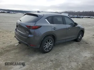 2019 Mazda CX-5 Signature with VIN JM3KFBEY3K0609305, listed as a Copart auction lot 44146455 with 33,104 mi miles and Salvage Title. Bid and sale history available at carsss.com. Image 3.