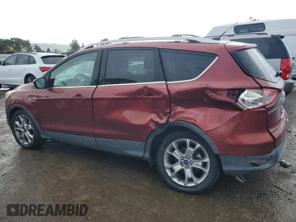 2016 Ford Escape Titanium with VIN 1FMCU9J91GUA99767, listed as a Copart auction lot 51172655 with 132,911 mi miles and Salvage title. Bid and sale history available at DreamBid. Image 2.