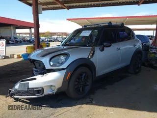 2014 MINI Countryman S with VIN WMWZC3C56EWP27328, listed as a IAAI auction lot 42187458 with 140,616 mi miles and . Bid and sale history available at DreamBid. Image 2.