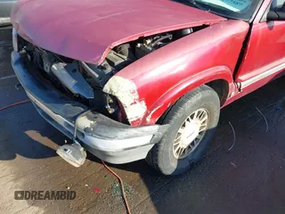 1995 GMC Jimmy SLE z VIN 1GKDT13W1SK528155, wystawiony jako IAAI lot #42177589 z przebiegiem 283 900 mil mil oraz . Historia ofert i sprzedaży dostępna na DreamBid. Obrazek 17.