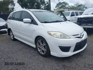 2009 Mazda 5 Sport with VIN JM1CR293590341516, listed as a IAAI auction lot 42218331 with 104,799 mi miles and . Bid and sale history available at DreamBid. Image 1.