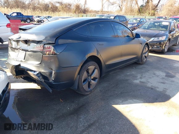 2020 Tesla Model 3 Standard Range Plus with VIN 5YJ3E1EA4LF745491, listed as a IAAI auction lot 41186726 with 74,575 mi miles and . Bid and sale history available at DreamBid. Image 4.