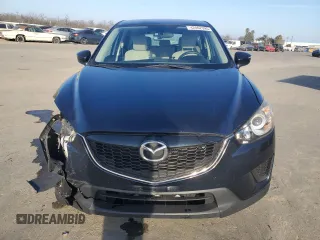 2015 Mazda CX-5 Sport z VIN JM3KE2BE6F0491107, wystawiony jako Copart lot #42462395 z przebiegiem 82 528 mil mil oraz Szkoda całkowita • Salvage title. Historia ofert i sprzedaży dostępna na DreamBid. Obrazek 5.