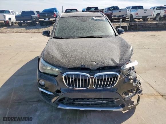 2018 BMW X1 sDrive28i with VIN WBXHU7C31J5H39068, listed as a Copart auction lot 49018985 with 100,611 mi miles and Salvage Title. Bid and sale history available at carsss.com. Image 5.