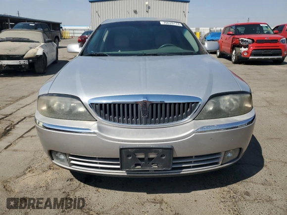2005 Lincoln LS Luxury z VIN 1LNHM86S25Y602837, wystawiony jako Copart lot #70620174 z przebiegiem 139 462 mil mil oraz Szkoda całkowita • Salvage title. Historia ofert i sprzedaży dostępna na DreamBid. Obrazek 5.