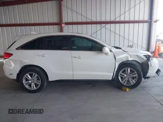 2015 Acura RDX with VIN 5J8TB4H30FL021288, listed as a IAAI auction lot 42595955 with 106,186 mi miles and . Bid and sale history available at DreamBid. Image 13.