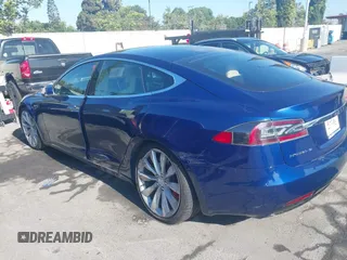 2016 Tesla Model S 90D with VIN 5YJSA1E48GF161604, listed as a IAAI auction lot 39977345 with 32,789 mi miles and . Bid and sale history available at DreamBid. Image 3.