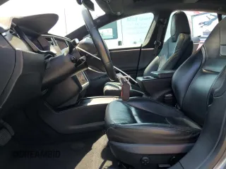 2016 Tesla Model S 90D z VIN 5YJSA1E22GF136325, wystawiony jako Copart lot #65238105 z przebiegiem 182 196 mil mil oraz Szkoda całkowita • Salvage title. Historia ofert i sprzedaży dostępna na DreamBid. Obrazek 7.