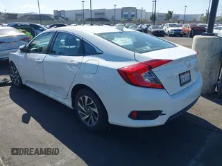 2018 Honda Civic EX with VIN 2HGFC2F71JH502564, listed as a IAAI auction lot 41933157 with 56,696 mi miles and . Bid and sale history available at DreamBid. Image 3.