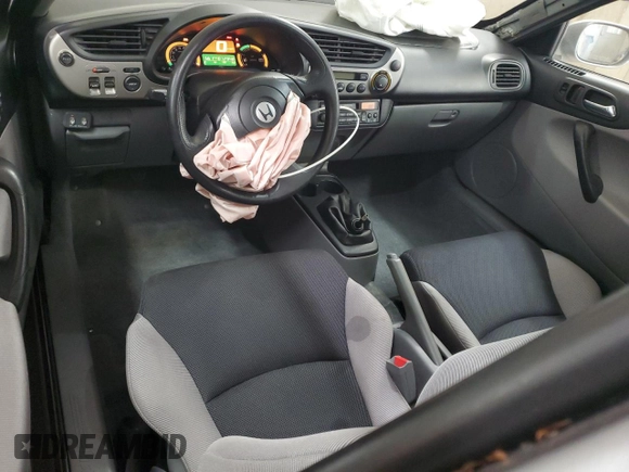 2000 Honda Insight with VIN JHMZE1376YT000164, listed as a Copart auction lot 53851695 with 72,940 mi miles and Salvage title. Bid and sale history available at DreamBid. Image 8.