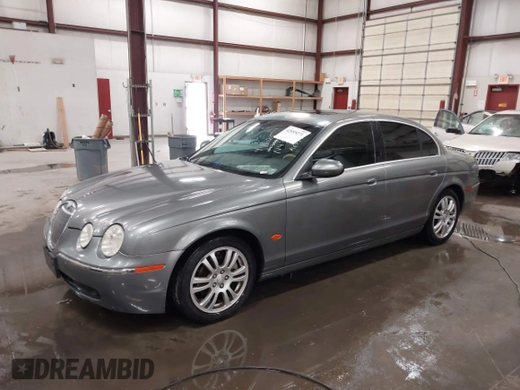 2005 Jaguar S-Type with VIN SAJWA01T85FN43991, listed as a IAAI auction lot 42055271 with 114,454 mi miles and . Bid and sale history available at DreamBid. Image 2.