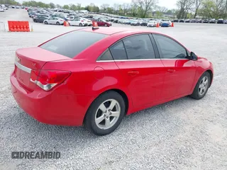 2014 Chevrolet Cruze 1LT z VIN 1G1PC5SB2E7165945, wystawiony jako IAAI lot #42016702 z przebiegiem 180 148 mil mil oraz . Historia ofert i sprzedaży dostępna na DreamBid. Obrazek 4.