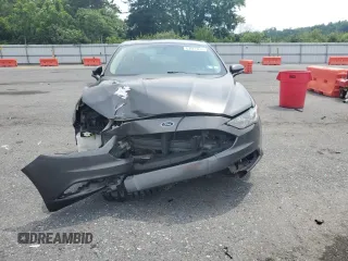 2017 Ford Fusion SE z VIN 3FA6P0HD7HR249569, wystawiony jako Copart lot #63072895 z przebiegiem 154 607 mil mil oraz Szkoda całkowita • Salvage title. Historia ofert i sprzedaży dostępna na DreamBid. Obrazek 5.
