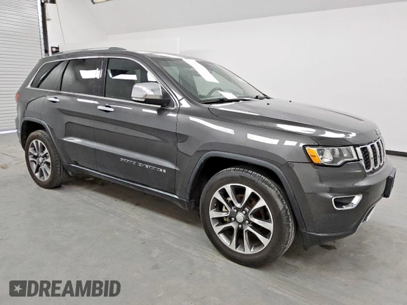2018 Jeep Grand Cherokee Limited z VIN 1C4RJEBG3JC340061, wystawiony jako Copart lot #56654975 z przebiegiem 151 443 mil mil oraz Czysty tytuł • Clean title. Historia ofert i sprzedaży dostępna na DreamBid. Obrazek 4.