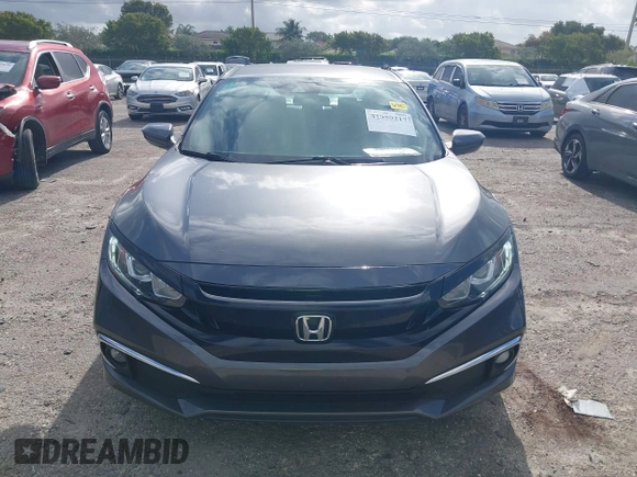 2019 Honda Civic Sport with VIN 2HGFC2F89KH563333, listed as a IAAI auction lot 41959217 with 66,068 mi miles and . Bid and sale history available at DreamBid. Image 6.