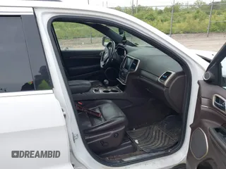 2014 Jeep Grand Cherokee Summit z VIN 1C4RJFJTXEC346627, wystawiony jako IAAI lot #42332200 z przebiegiem 231 007 mil mil oraz . Historia ofert i sprzedaży dostępna na DreamBid. Obrazek 5.