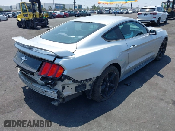 2015 Ford Mustang V6 with VIN 1FA6P8AM1F5342967, listed as a IAAI auction lot 42164817 with 106,700 mi miles and . Bid and sale history available at DreamBid. Image 4.
