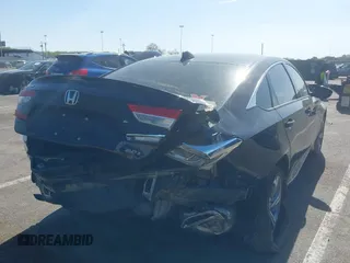 2020 Honda Accord EX-L with VIN 1HGCV2F57LA004141, listed as a IAAI auction lot 42136007 with 105,352 mi miles and . Bid and sale history available at DreamBid. Image 6.