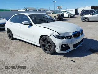 2022 BMW 3 Series 330i with VIN 3MW5R1J04N8C30165, listed as a IAAI auction lot 41412370 with 49,015 mi miles. Bid and sale history available at carsss.com. Image 1.
