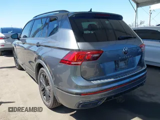 2022 Volkswagen Tiguan SE R-Line Black with VIN 3VVCB7AX8NM039730, listed as a IAAI auction lot 42313651 with 71,759 mi miles and . Bid and sale history available at DreamBid. Image 3.