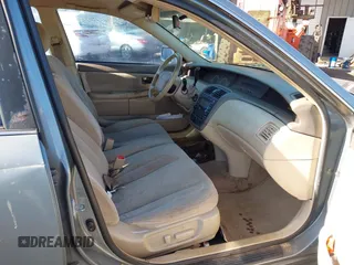 2001 Toyota Avalon XL w/Bucket Seats with VIN 4T1BF28B91U148985, listed as a IAAI auction lot 41538121 with 161,474 mi miles. Bid and sale history available at carsss.com. Image 5.