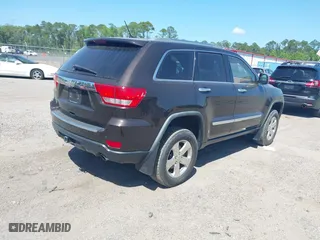 2011 Jeep Grand Cherokee Overland with VIN 1J4RR6GT1BC647292, listed as a IAAI auction lot 42069742 with 199,340 mi miles. Bid and sale history available at carsss.com. Image 4.