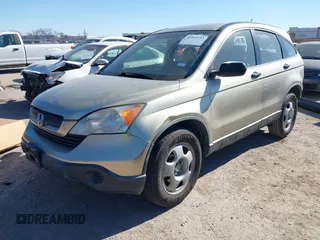 2007 Honda CR-V LX with VIN JHLRE38397C007842, listed as a IAAI auction lot 41411153 with 297,262 mi miles. Bid and sale history available at carsss.com. Image 2.