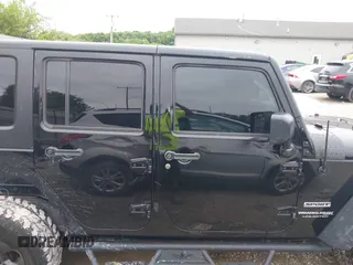 2018 Jeep Wrangler Unlimited Freedom z VIN 1C4BJWDG0JL803889, wystawiony jako IAAI lot #42782367 z przebiegiem 105 738 mil mil oraz . Historia ofert i sprzedaży dostępna na DreamBid. Obrazek 14.