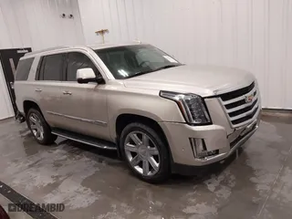 2017 Cadillac Escalade Luxury with VIN 1GYS4BKJ5HR254402, listed as a IAAI auction lot 41492160 with 76,419 mi miles. Bid and sale history available at carsss.com. Image 1.