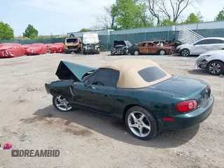 2001 Mazda MX-5 Miata with VIN JM1NB353810212361, listed as a IAAI auction lot 42128732 with 115,860 mi miles and . Bid and sale history available at DreamBid. Image 3.