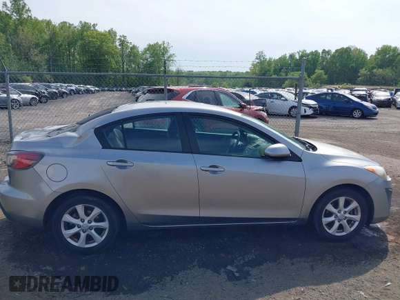 2011 Mazda Mazda3 i Touring with VIN JM1BL1VGXB1372499, listed as a IAAI auction lot 42112283 with 98,564 mi miles. Bid and sale history available at carsss.com. Image 14.