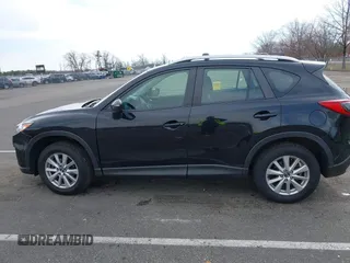2016 Mazda CX-5 Sport with VIN JM3KE4BY7G0893578, listed as a IAAI auction lot 41853840 with 95,937 mi miles. Bid and sale history available at carsss.com. Image 14.