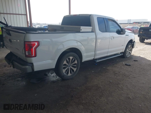 2015 Ford F-150 XL with VIN 1FTEX1CP0FKE84653, listed as a IAAI auction lot 41794451 with 156,552 mi miles. Bid and sale history available at carsss.com. Image 4.