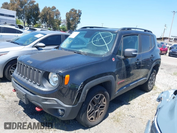 2017 Jeep Renegade Deserthawk z VIN ZACCJBCB4HPF18220, wystawiony jako IAAI lot #41719737 z przebiegiem 87 332 mil mil oraz . Historia ofert i sprzedaży dostępna na DreamBid. Obrazek 2.