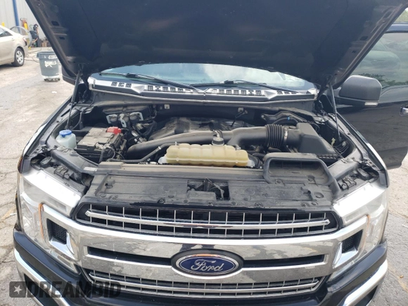 2020 Ford F-150 XL с VIN 1FTEW1E44LKF51143, выставлен на аукционе Copart как лот 56980275 с пробегом 93 447 миль миль и Списание • Salvage title. История ставок и продаж доступна на DreamBid. Изображение 11.