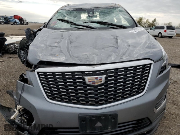 2021 Cadillac XT5 FWD Luxury with VIN 1GYKNAR44MZ192797, listed as a Copart auction lot 87304294 with 0 mi miles and Salvage Title. Bid and sale history available at carsss.com. Image 5.