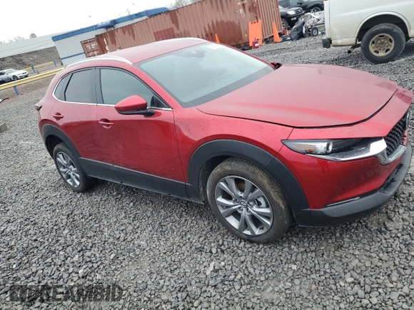 2023 Mazda CX-30 S Carbon Edition with VIN 3MVDMBCM3PM521753, listed as a Copart auction lot 85994464 with 10,327 mi miles and Salvage title. Bid and sale history available at DreamBid. Image 4.