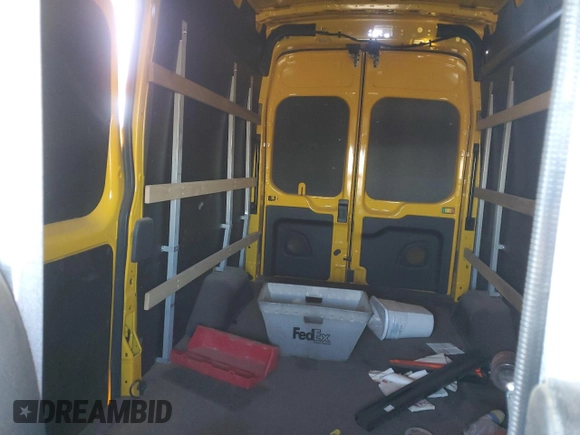 2023 Ford Transit Cargo with VIN 1FTBR1X89PKA25414, listed as a Copart auction lot 46476085 with 61,328 mi miles and Salvage title. Bid and sale history available at DreamBid. Image 10.