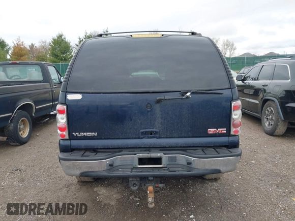 2005 GMC Yukon SLT with VIN 1GKEC13T45J139885, listed as a IAAI auction lot 41796394 with 229,494 mi miles. Bid and sale history available at carsss.com. Image 16.