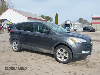 2015 Ford Escape SE with VIN 1FMCU0GXXFUB99852, listed as a IAAI auction lot 41704198 with 84,735 mi miles. Bid and sale history available at carsss.com. Image 16.