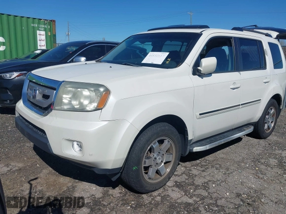 2011 Honda Pilot Touring with VIN 5FNYF4H97BB067954, listed as a IAAI auction lot 41832617 with 141,141 mi miles. Bid and sale history available at carsss.com. Image 17.