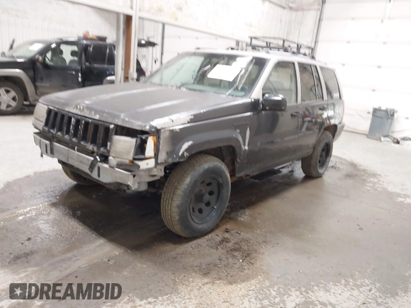 1994 Jeep Grand Cherokee Limited with VIN 1J4GZ78Y8RC165923, listed as a IAAI auction lot 42275894 with 247,977 mi miles and . Bid and sale history available at DreamBid. Image 2.