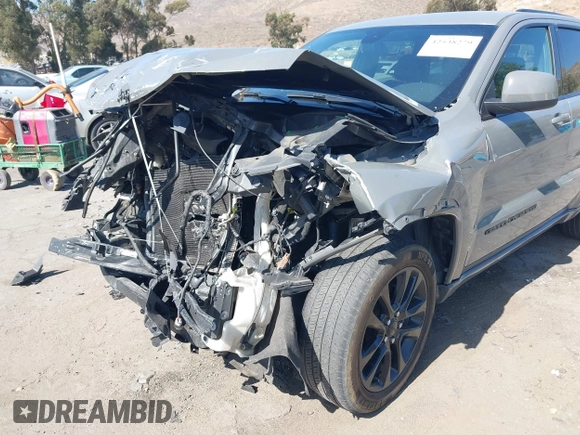 2020 Jeep Grand Cherokee Laredo E with VIN 1C4RJEAG3LC247027, listed as a IAAI auction lot 42538279 with 97,601 mi miles and . Bid and sale history available at DreamBid. Image 6.