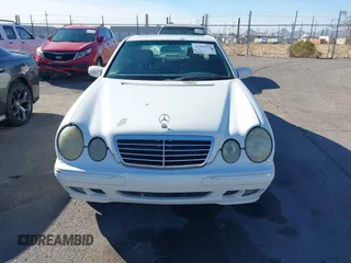 2002 Mercedes-Benz E-Class with VIN WDBJF82J62X076581, listed as a IAAI auction lot 41194976 with 235,453 mi miles. Bid and sale history available at carsss.com. Image 12.