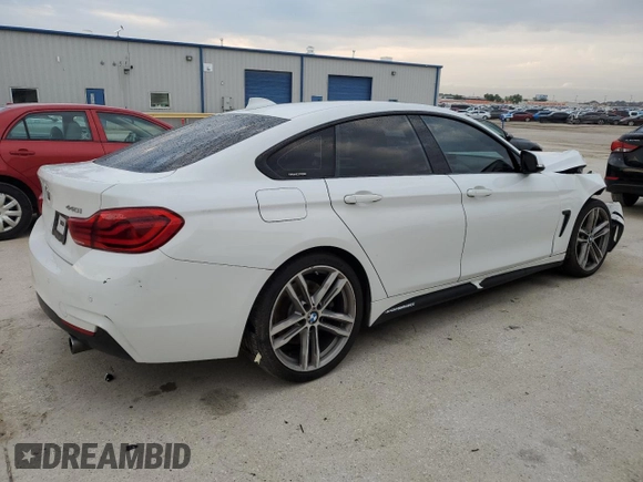 2018 BMW 4 Series 440i with VIN WBA4J5C51JBF06736, listed as a Copart auction lot 64165524 with 65,066 mi miles and Salvage Title. Bid and sale history available at DreamBid. Image 3.